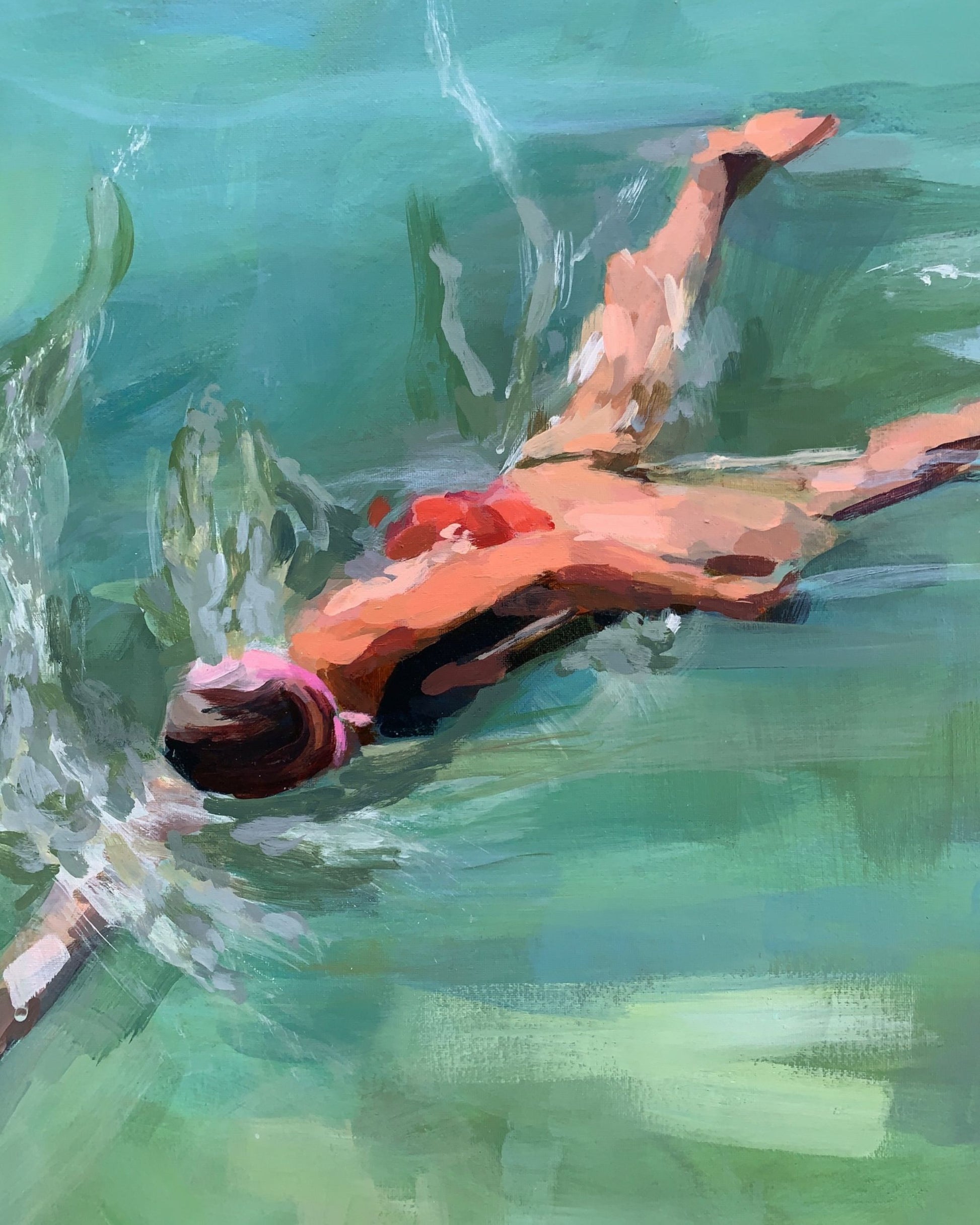woman swimming through teal green water details