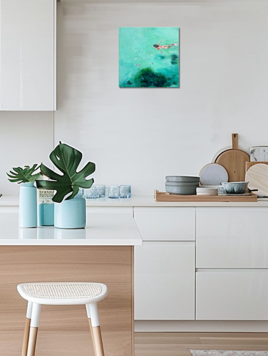 Modern kitchen with white cabinets, wooden countertop, and decorative elements.