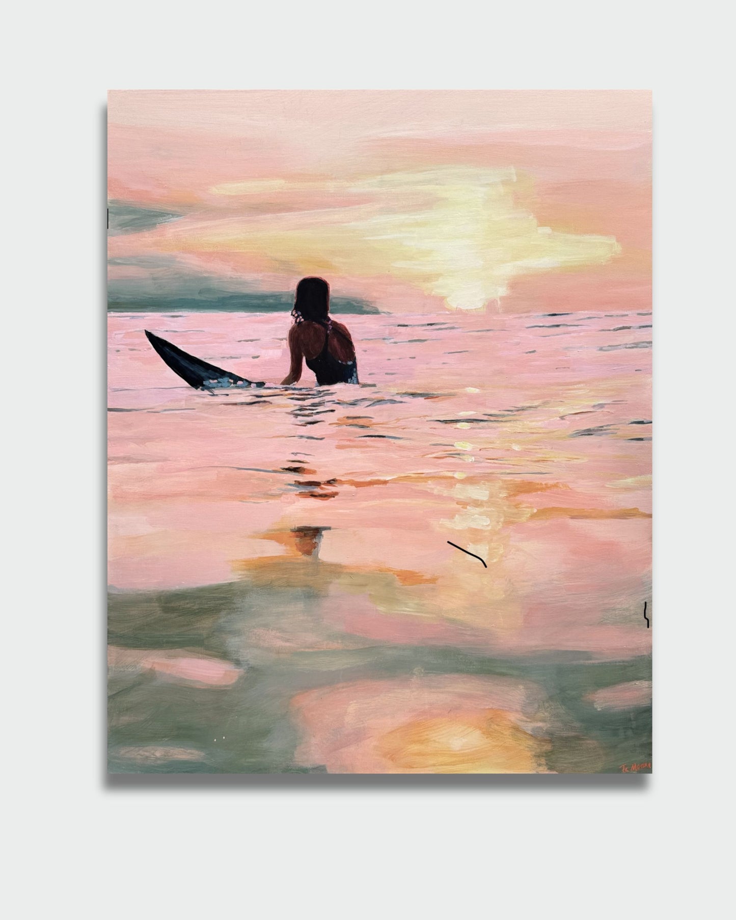 Surfing at sunset